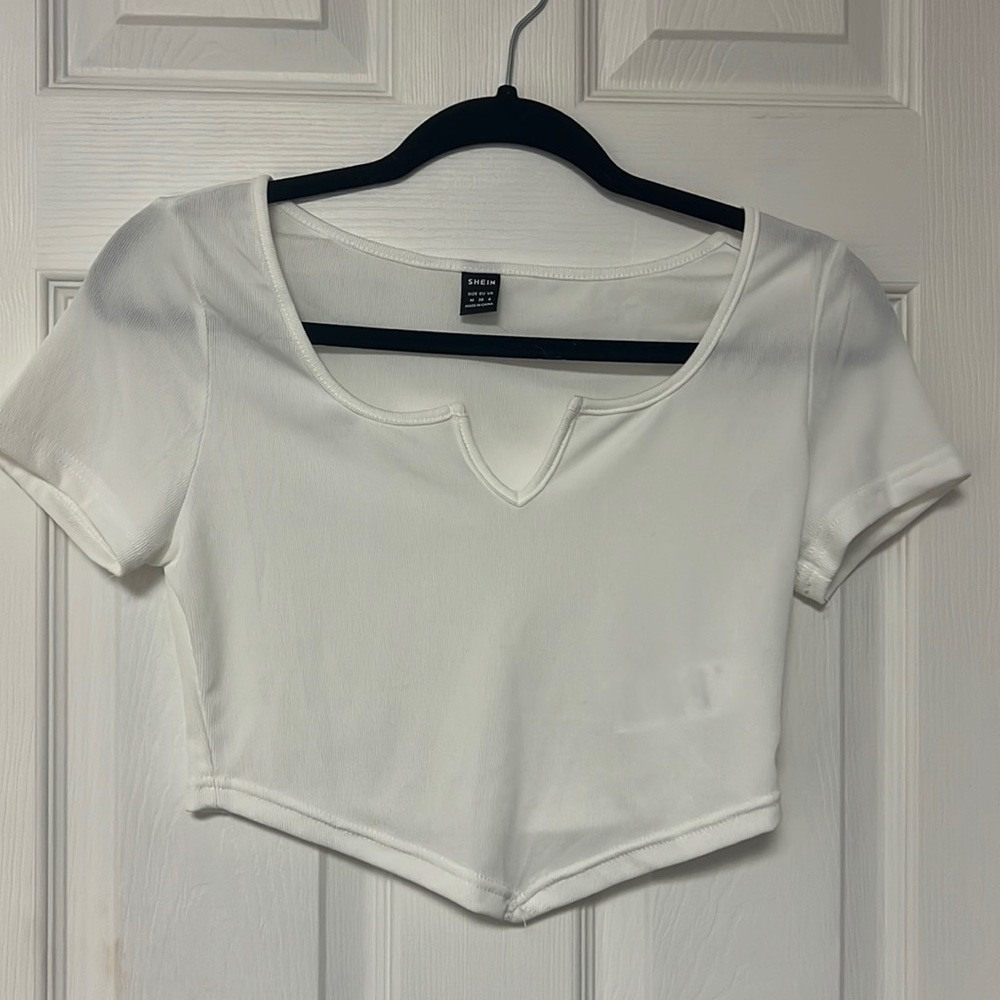 White cropped top. Never worn.